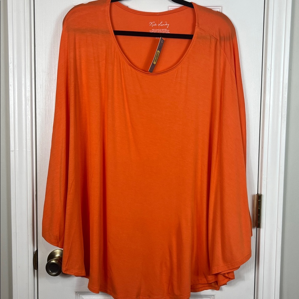 NWT Kate Landry orange one Size top. Has bat wing style. 96% modal, 4% spandex